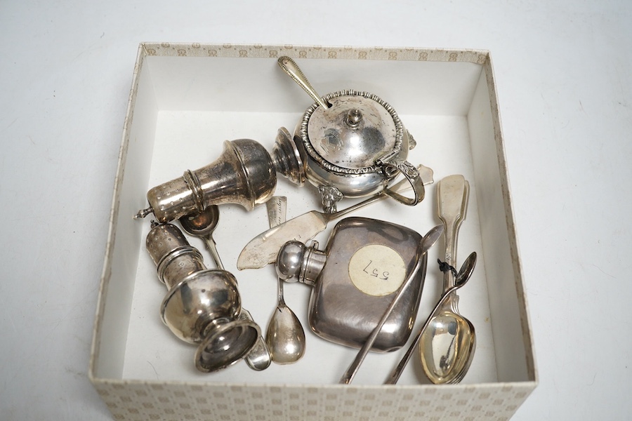 A collection of small silver to include two pepper pots, a mustard pot, a small hip flask, a pair of sugar tongs, a set of five Victorian fiddle pattern teaspoons, two other spoons and a butter knife, 544g gross. Conditi